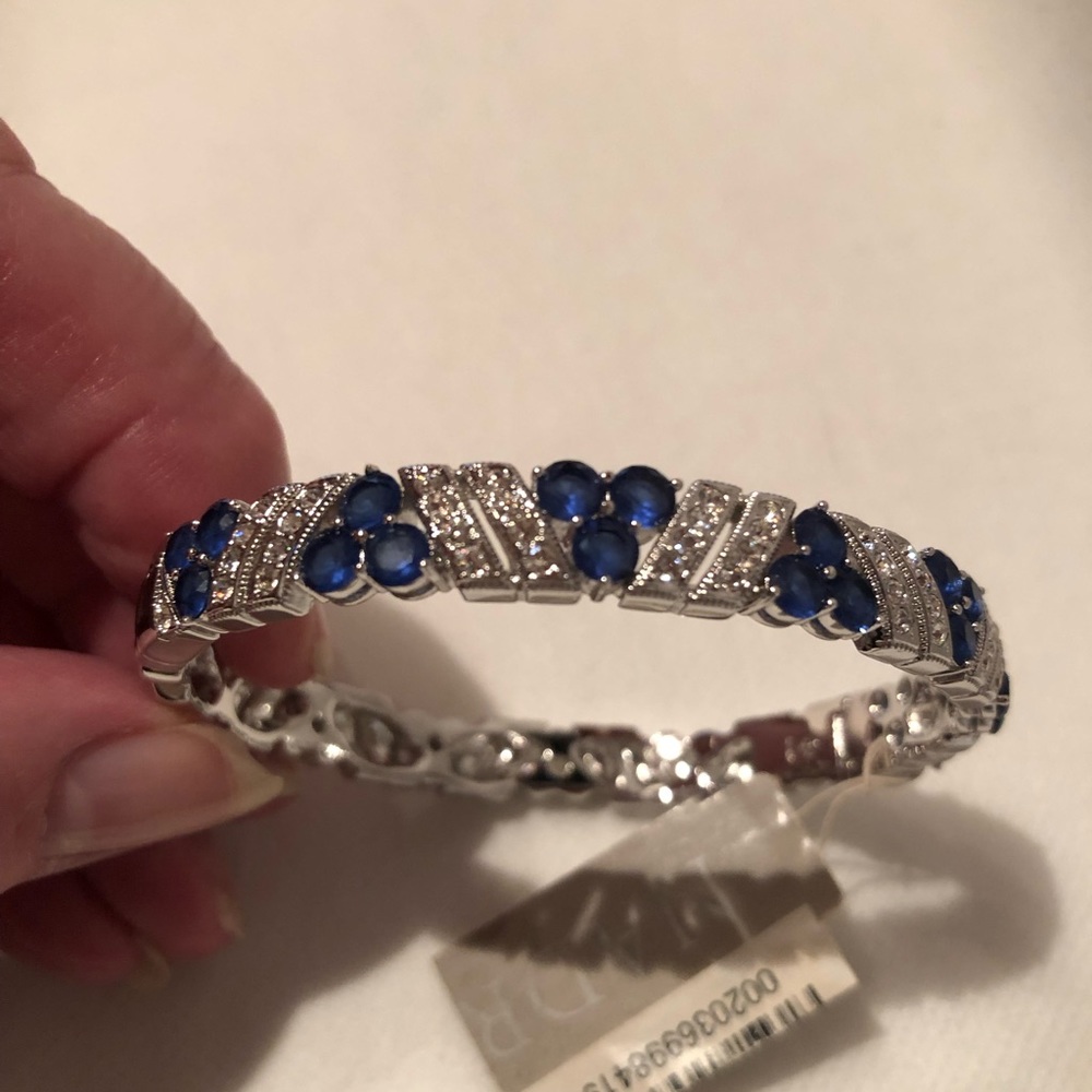 NWT Gorgeous Nadri Rhodium plated CZ and faux sapphire bracelet. ( 8.25”)